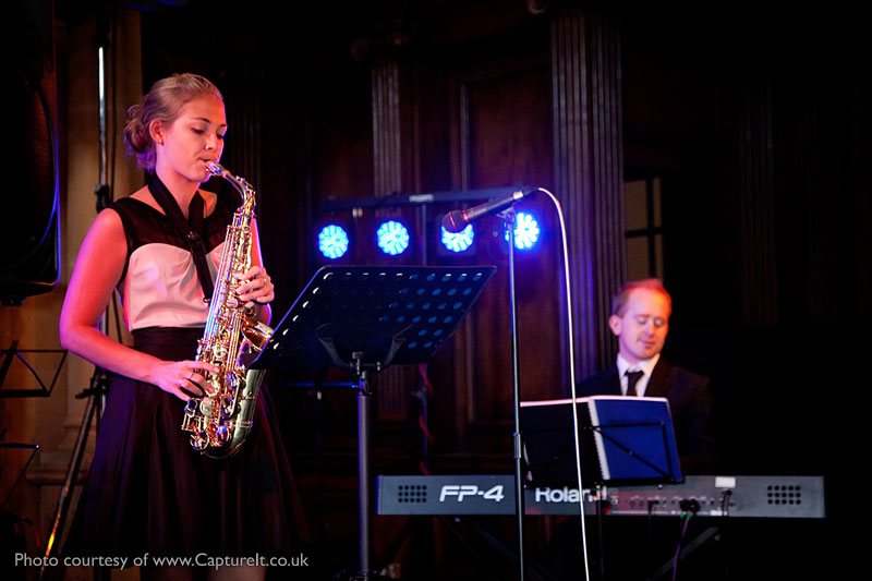 Jazz duo of Claire Waterhouse (saxophone) and Mike Paul-Smith (piano) performing at Anthony and Becky's Wedding Reception at Pinewood Studios, Buckinghamshire.  Photo courtesy of Capture It.