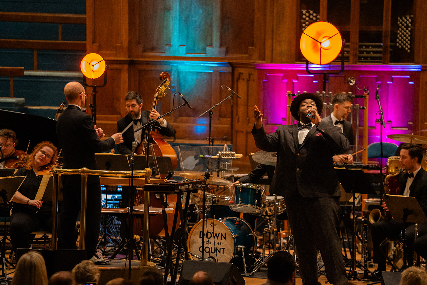 Vocalist Marvin Muoneké performing with The Down for the Count Swing Orchestra conducted by Mike Paul-Smith