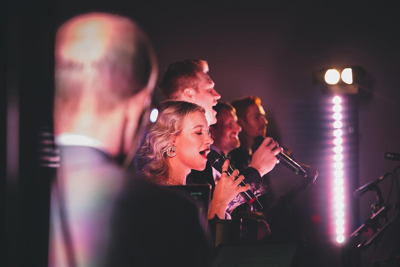 Vocalist Saara Kaldma performing with Down for the Count