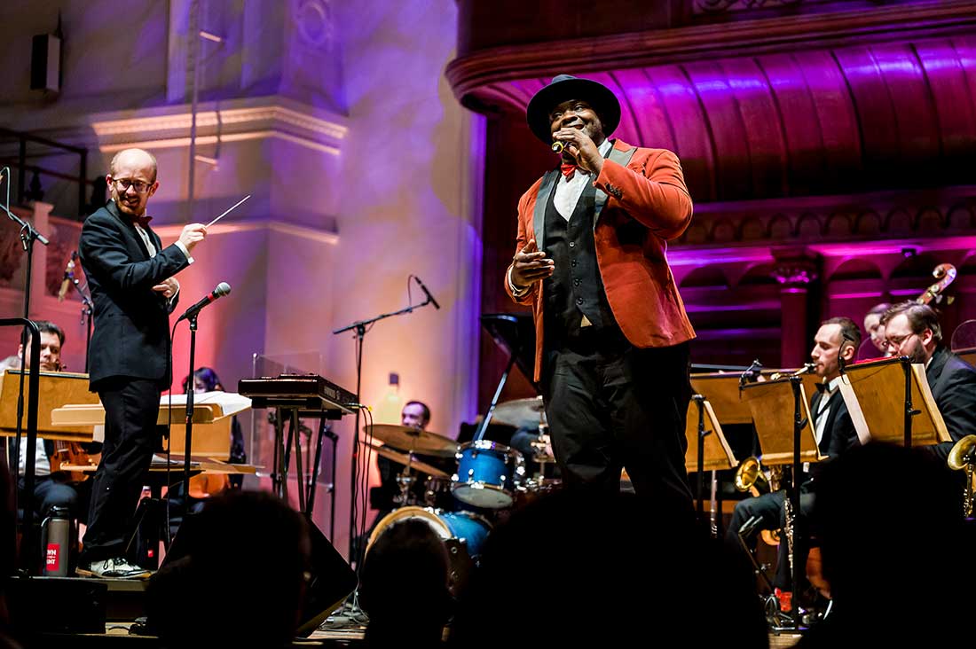 Vocalist Marvin Muoneké and conductor Mike Paul-Smith with the Down for the Count Swing Orchestra