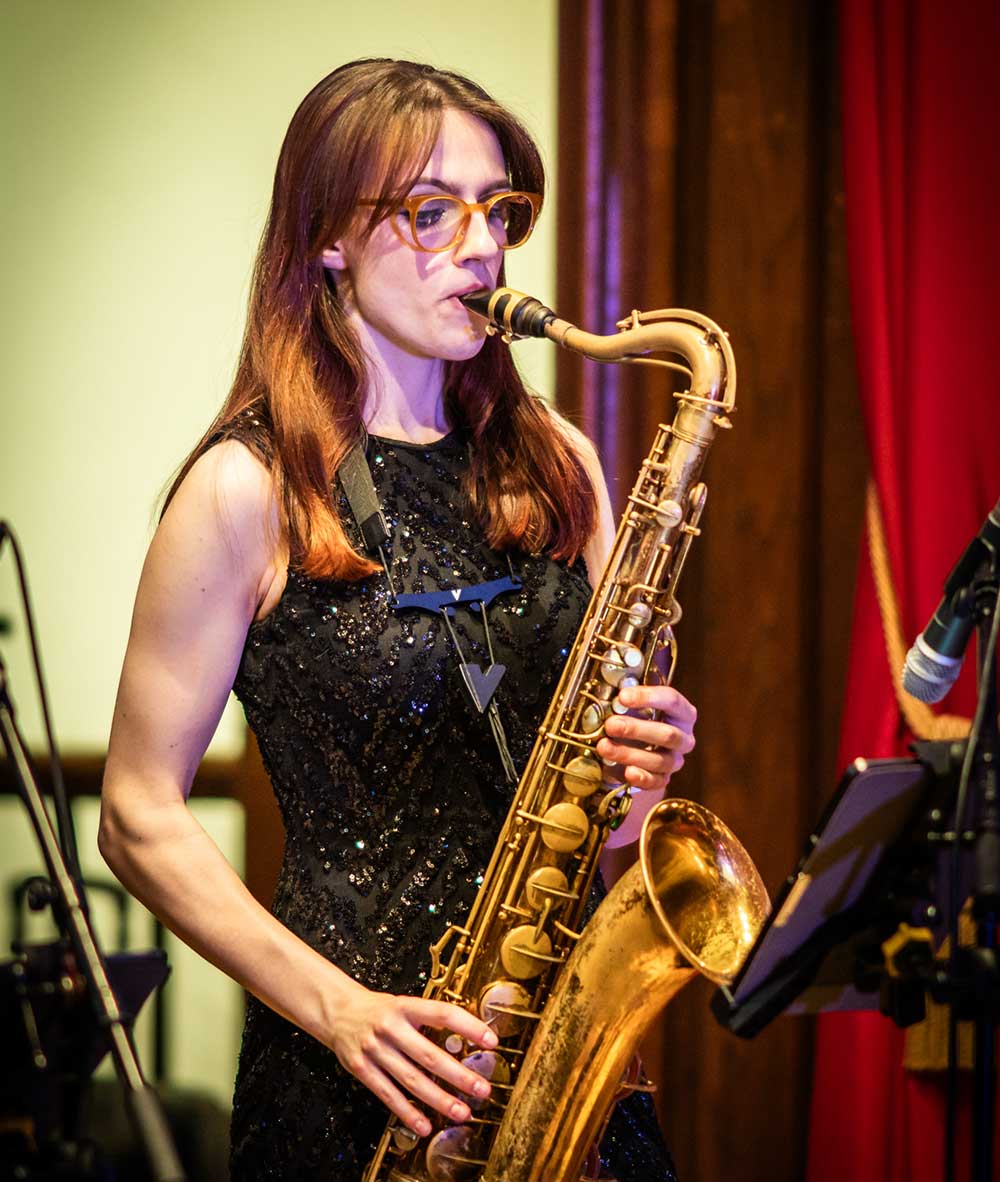 Alex Clarke performing with Down for the Count at the London Gala Ball, Porchester Hall, London