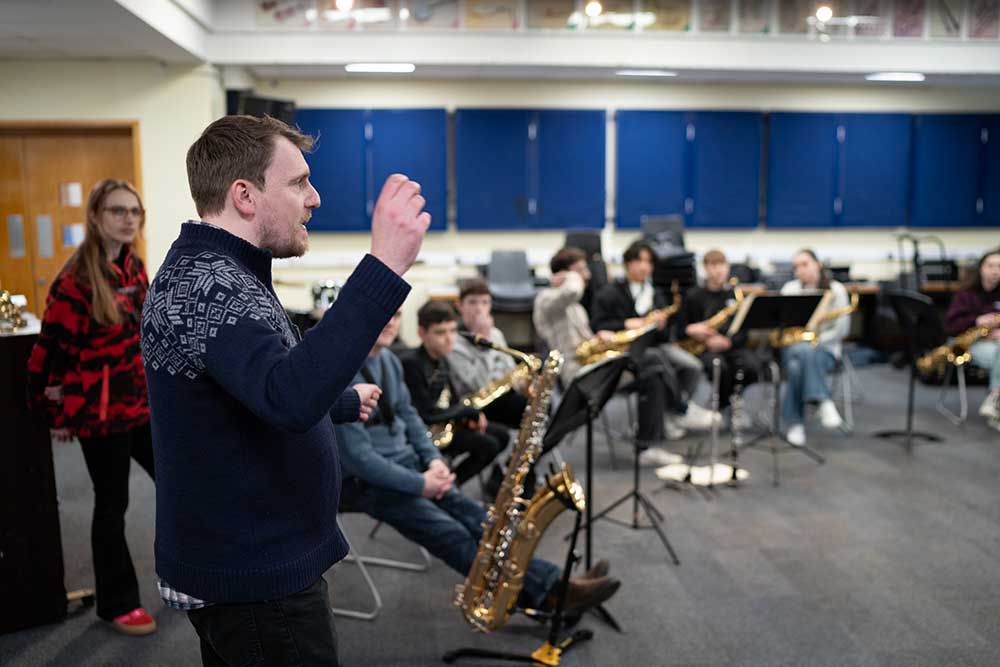 Simon Joyner leading a big band workshop with Down for the Count Swing Orchestra