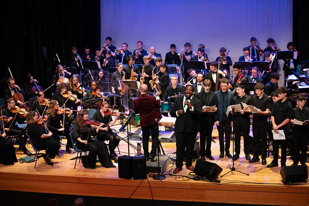 An educational participation workshop with Down for the Count Swing Orchestra